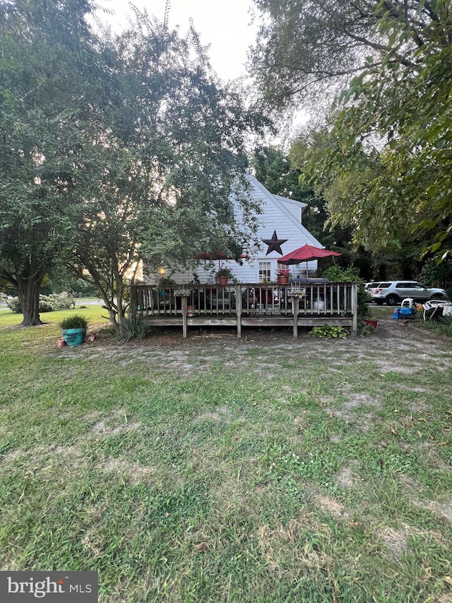 view of yard featuring a deck