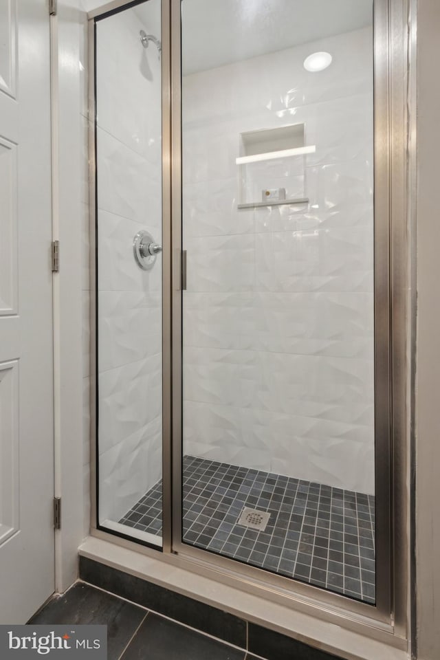 bathroom with an enclosed shower