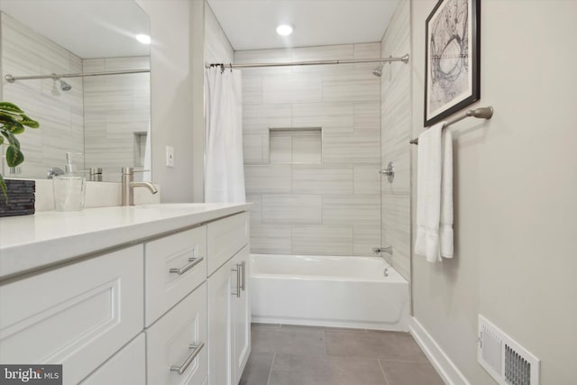 bathroom with vanity, tile patterned floors, and shower / tub combo with curtain