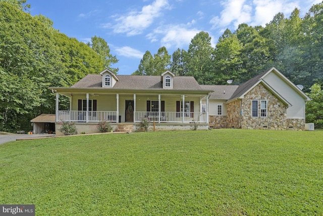 cape cod-style house featuring a porch and a front lawn