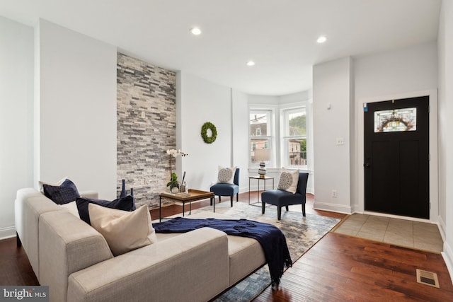 living room featuring dark hardwood / wood-style floors