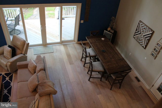 dining room featuring light hardwood / wood-style floors