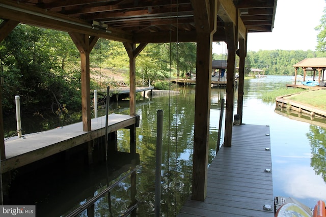 dock area featuring a water view