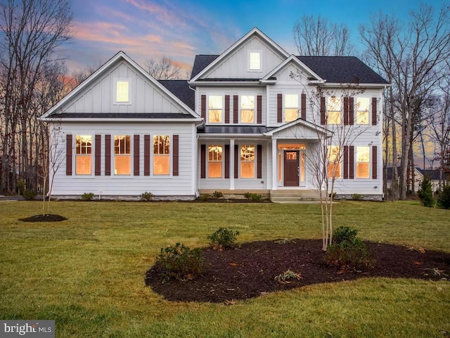 view of front of property with a yard