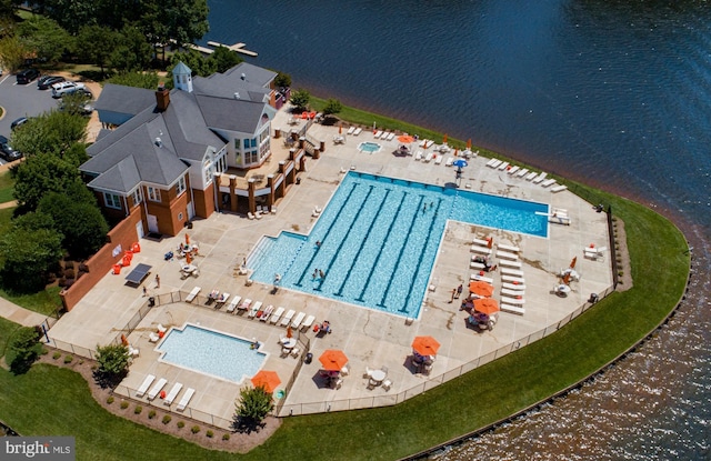 drone / aerial view featuring a water view