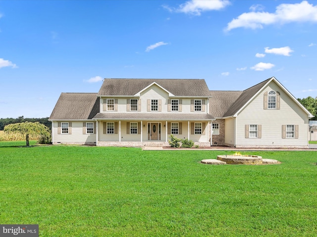 view of front of home featuring a front lawn and a porch