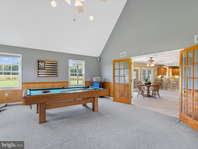 recreation room featuring light colored carpet, pool table, and french doors