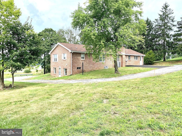 view of front of home with a front yard