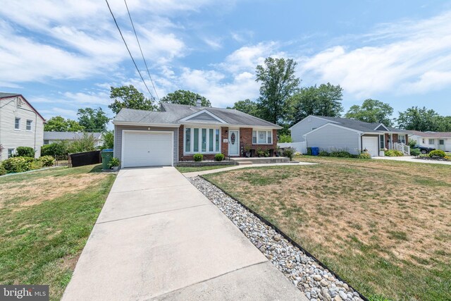 ranch-style house with a garage and a front yard