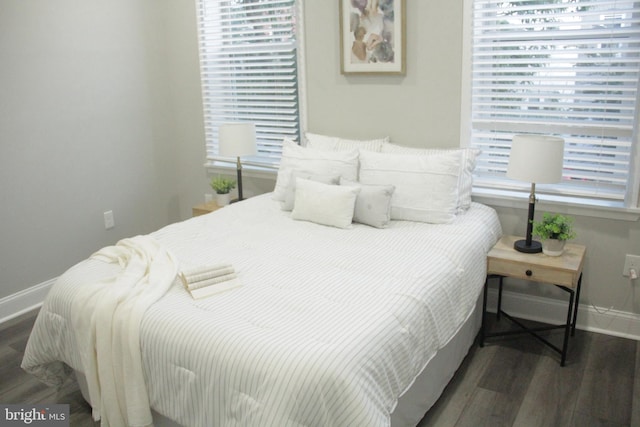 bedroom featuring dark wood-type flooring