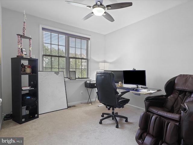 carpeted office with ceiling fan