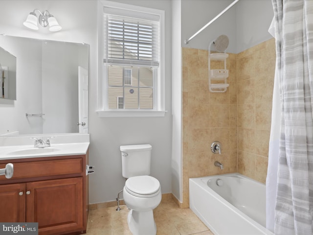 full bathroom with vanity, toilet, tile patterned flooring, and shower / bath combo