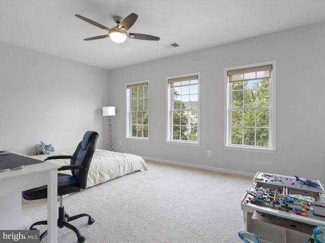 bedroom featuring ceiling fan and carpet flooring