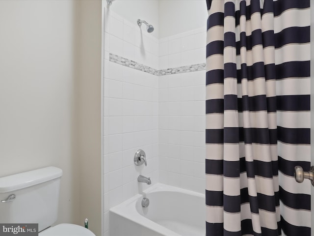 bathroom featuring radiator, shower / tub combo, and toilet