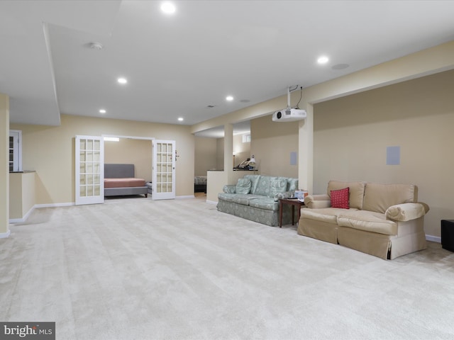 living room with french doors and light colored carpet