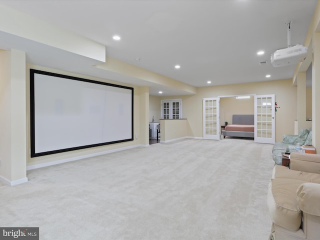 carpeted cinema with french doors