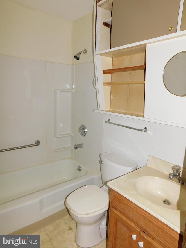 full bathroom featuring tile patterned flooring, bathing tub / shower combination, toilet, and vanity