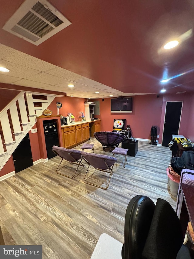 recreation room featuring hardwood / wood-style flooring