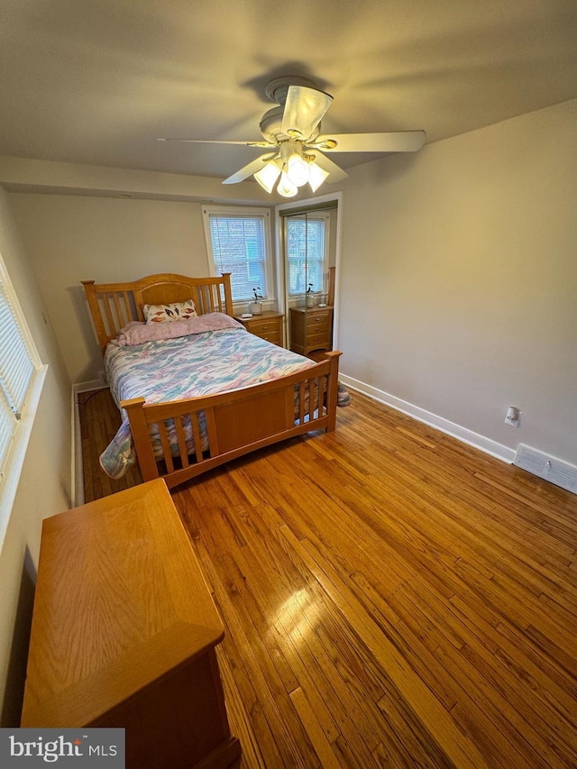 bedroom featuring ceiling fan and wood-type flooring