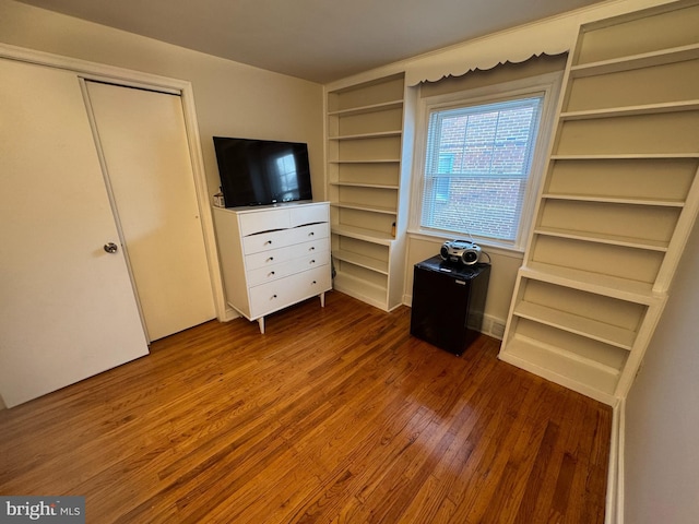 unfurnished bedroom featuring wood-type flooring