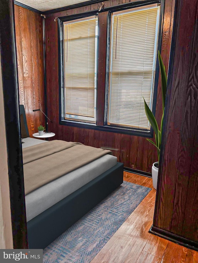 1830 E Cornwall St, Philadelphia, PA 19134 - bedroom featuring wood walls and wood finished floors