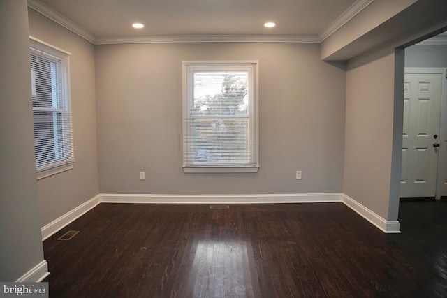 unfurnished room featuring dark hardwood / wood-style floors and ornamental molding