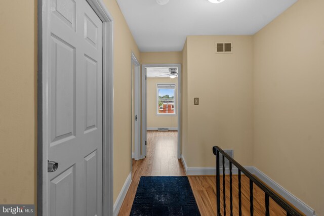 hallway featuring light hardwood / wood-style flooring