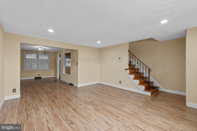 unfurnished room featuring light hardwood / wood-style flooring