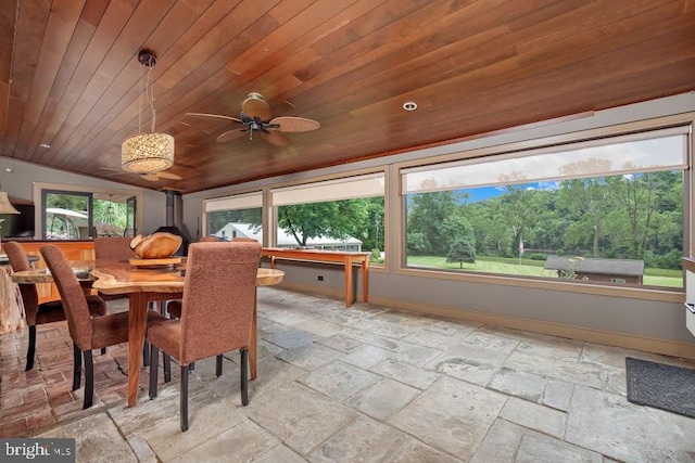 dining room featuring wood ceiling, ceiling fan, lofted ceiling, and light tile patterned floors