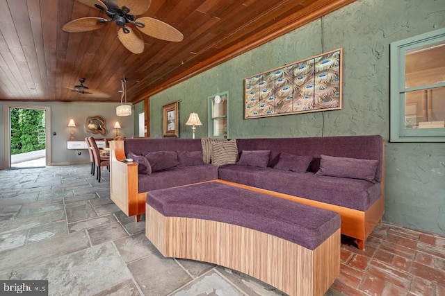 interior space with wood ceiling, ceiling fan, and lofted ceiling