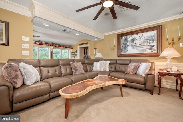 carpeted living room featuring ceiling fan, vaulted ceiling, and crown molding