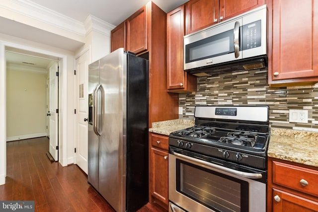 kitchen with stainless steel appliances, ornamental molding, light stone counters, and decorative backsplash