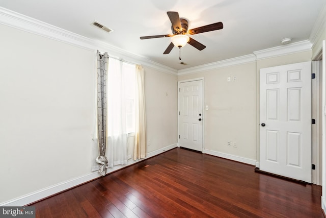 unfurnished room with dark wood-type flooring, ceiling fan, and crown molding