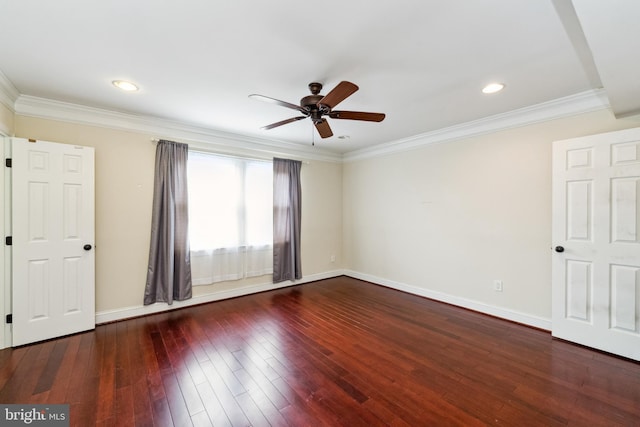 empty room with ornamental molding, ceiling fan, and dark hardwood / wood-style flooring