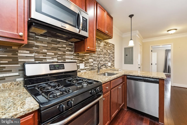 kitchen with sink, appliances with stainless steel finishes, tasteful backsplash, light stone counters, and ornamental molding