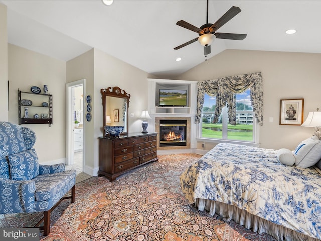 bedroom with ceiling fan and vaulted ceiling