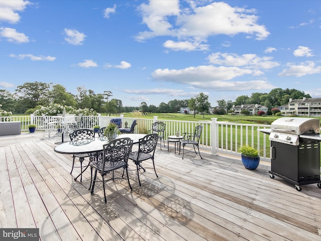 wooden deck featuring area for grilling