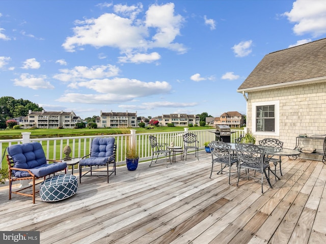 wooden deck with area for grilling