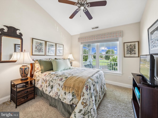 carpeted bedroom with lofted ceiling and ceiling fan