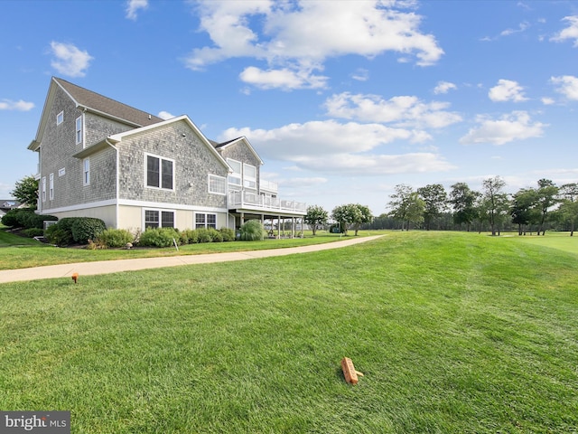 view of property exterior with a yard