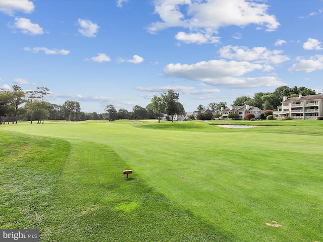 view of community featuring a lawn