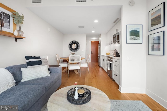 living room featuring light hardwood / wood-style floors