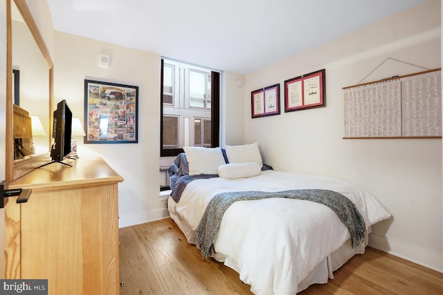 bedroom featuring light hardwood / wood-style floors