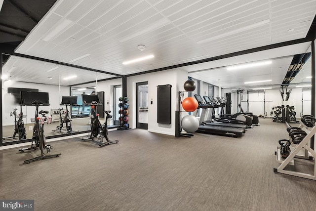 exercise room with carpet floors