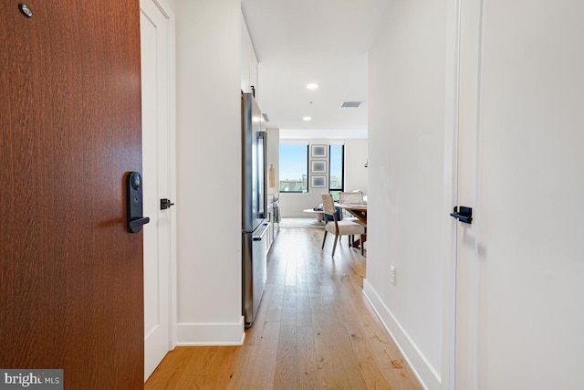 hall featuring light hardwood / wood-style flooring