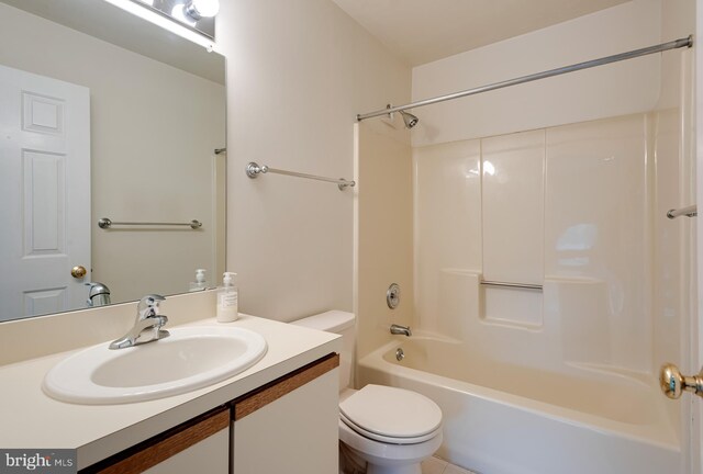 full bathroom with vanity, toilet, tile patterned floors, and shower / bathtub combination