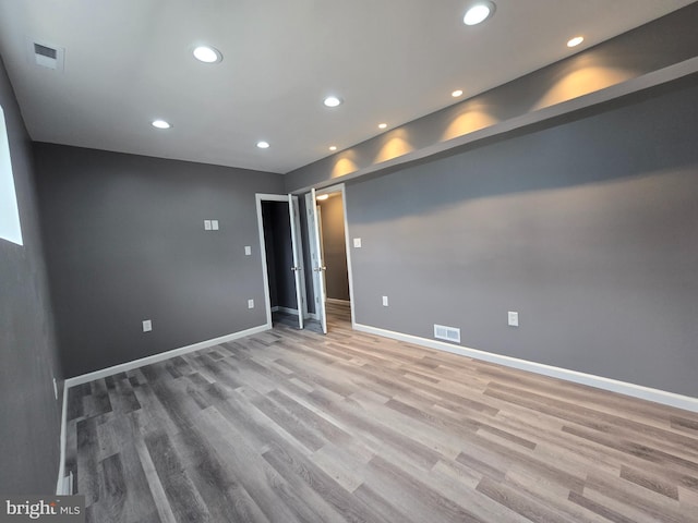 empty room with light wood-type flooring