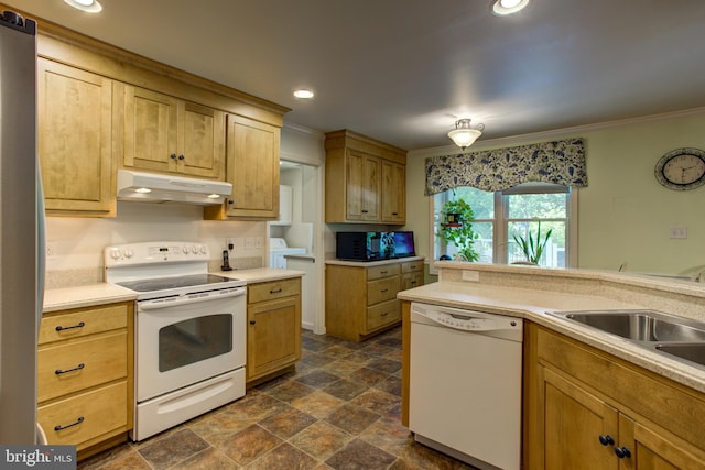 kitchen with sink, ornamental molding, white appliances, dark tile patterned floors, and light brown cabinets