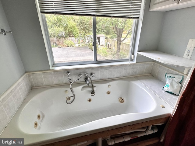 bathroom featuring a washtub