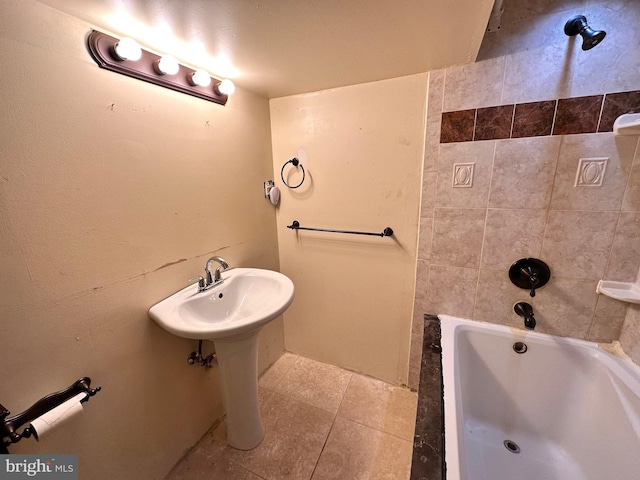 bathroom featuring sink and tile patterned flooring